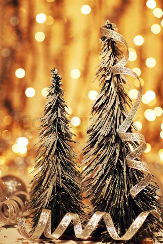 Christmas tree decoration as holiday background with winter ornament & abstract gold defocus lights, stock photo