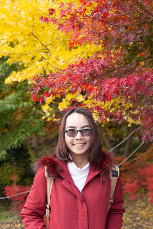 Happy woman relax travel in Japan. Smile and happy trip travel nature in Japan at Autumn, stock photo