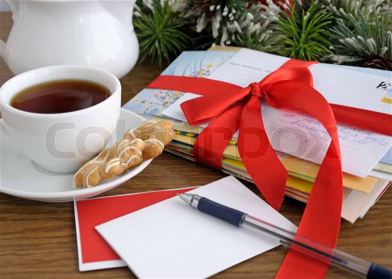 Write greeting or invite your friends and family on holiday, stock photo