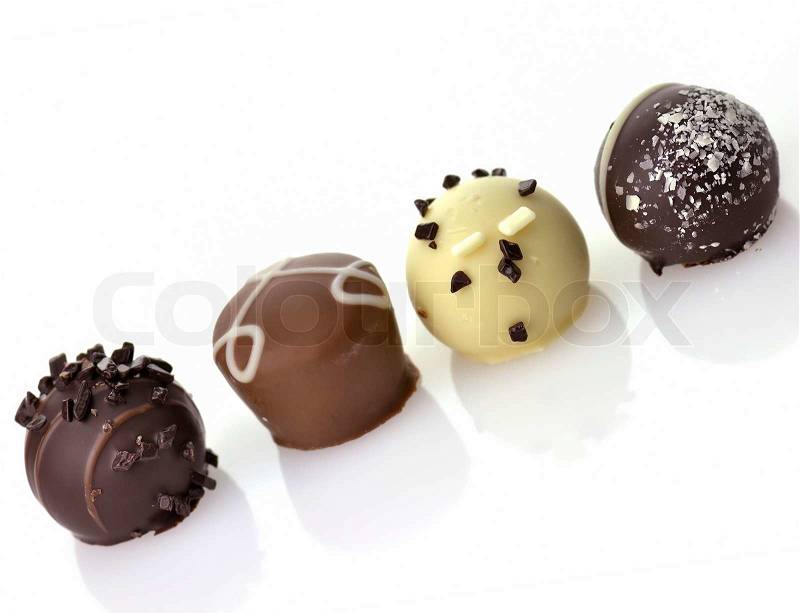 Delicious Chocolate Pralines ,Close Up,On White Background, stock photo