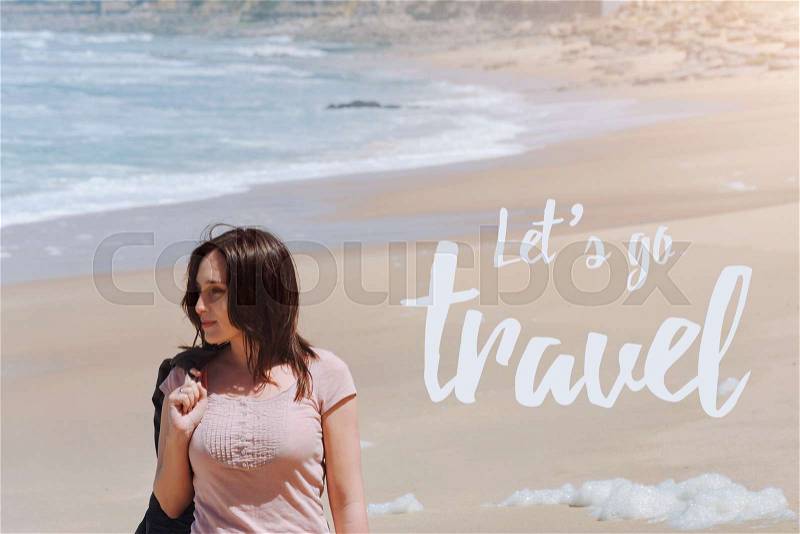 Travel quote, words Let\'s Go Travel. Summer vacation happiness carefree joyful woman standing on sand enjoying tropical beach. Lonely traveler on the ocean coast, stock photo