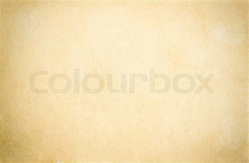 Background texture of old faded yellow paper, stock photo