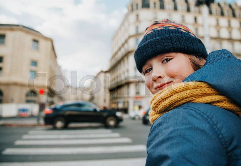 Little boy is going to cross road alone, stock photo