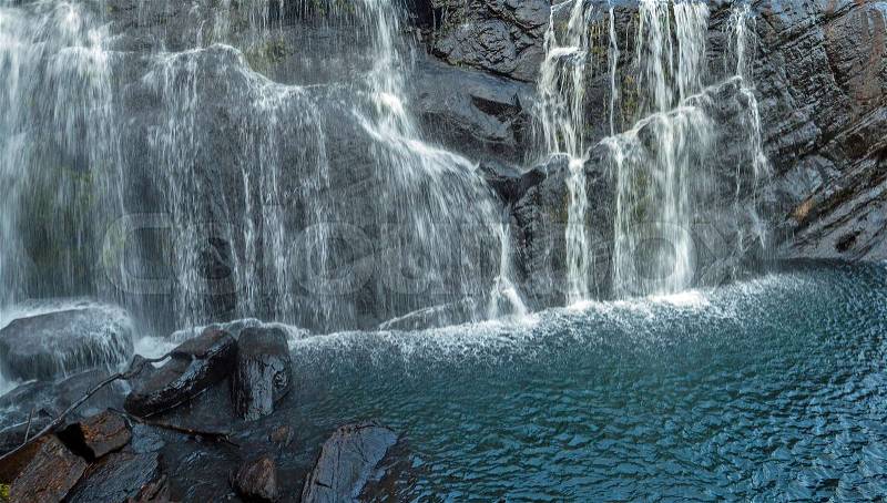 Waterfall spring Panoramic rocks cascade Falls in Horton Plains National Park Sri Lanka, stock photo