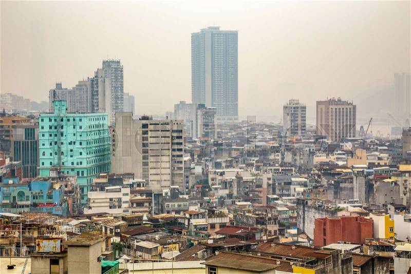 Macau city center panorama with poor slums blocks and tall living buildings, China, stock photo