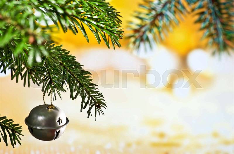 Christmas Bell with Christmas Twig on the Unfocused Background, stock photo