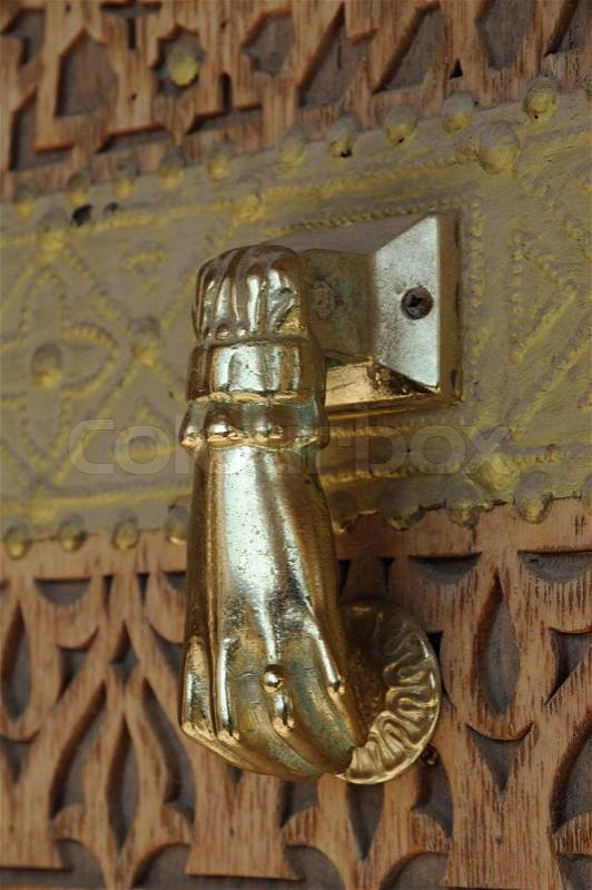 Golden Door Knocker in Abu Dhabi, United Arab Emirates, stock photo