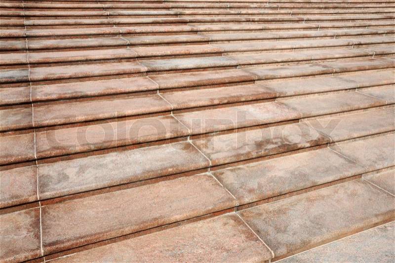 Symmetrical pattern of red steps outside of a theater, stock photo