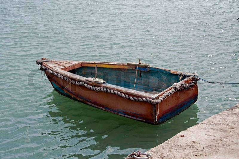 wooden-boat-on-the-sea-stock-photo-colourbox