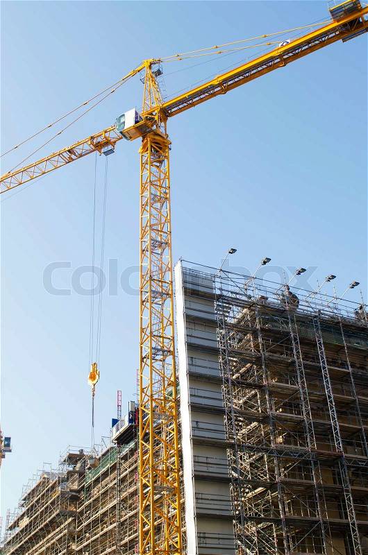 Construction crane on the site, stock photo