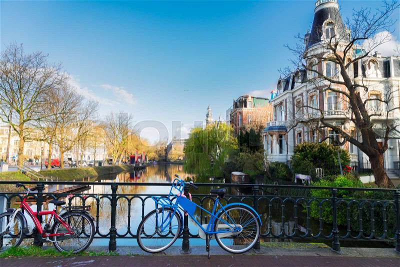 Romantic scenery with one of the canals in Amsterdam old town, Netherlands, stock photo