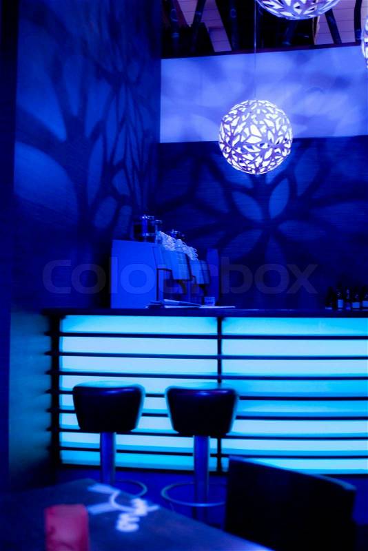 Bar with blue neon lights | Stock Photo | Colourbox