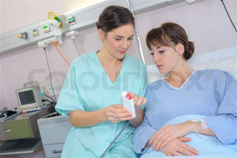 Socializing with the nurse, stock photo