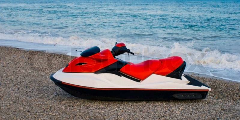 Red jet ski in the beach sea, stock photo