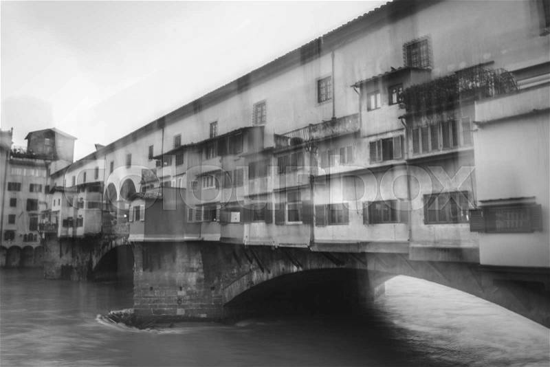 Blurry vision of Ponte Vecchio, blurry vision headache concept, stock photo