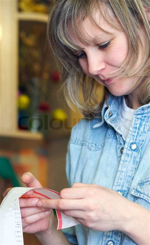 Smile woman is read the price list, stock photo