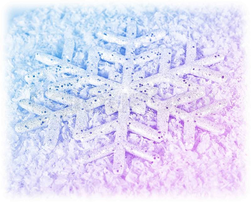 Snowflake winter holiday background, Christmas tree ornament and decoration, big blue pink snow flake card, abstract winter natural texture pattern, seasonal nature, stock photo