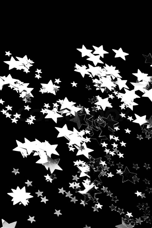 The black background whit silver stars, stock photo