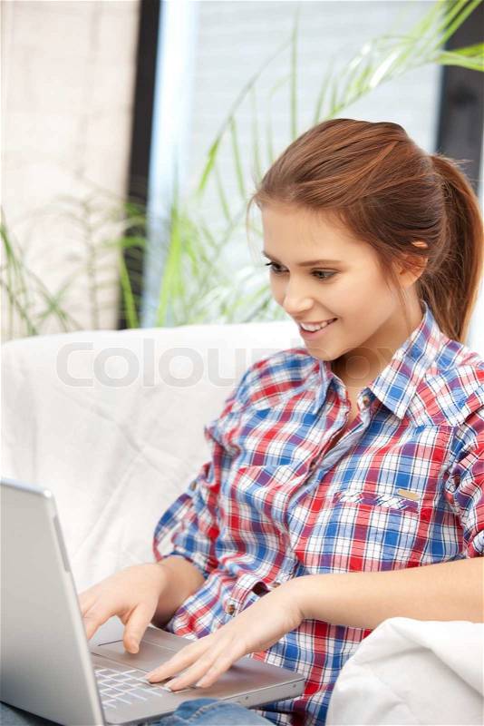 Picture of happy woman with laptop computer, stock photo