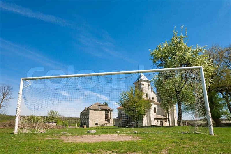 Church of Annunciation of Blessed Virgin Mary Sydoriv village, Ternopil region, Ukraine, Built in 1726-1730 and football goal, stock photo