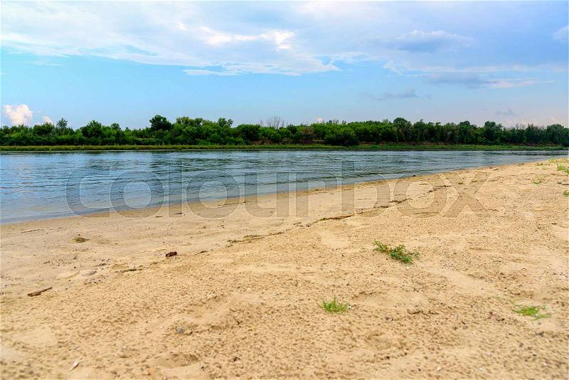 Don river with golden sand shore. Beach landscape near Rostov on Don, Russia, stock photo