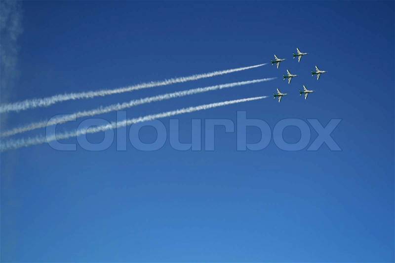 Group of six airplanes making formation, stock photo