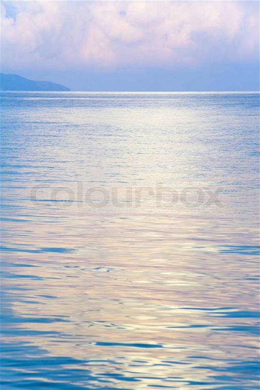 Beautiful sunset in soft pink color and shining sea surface Crimea, Ukraine, stock photo