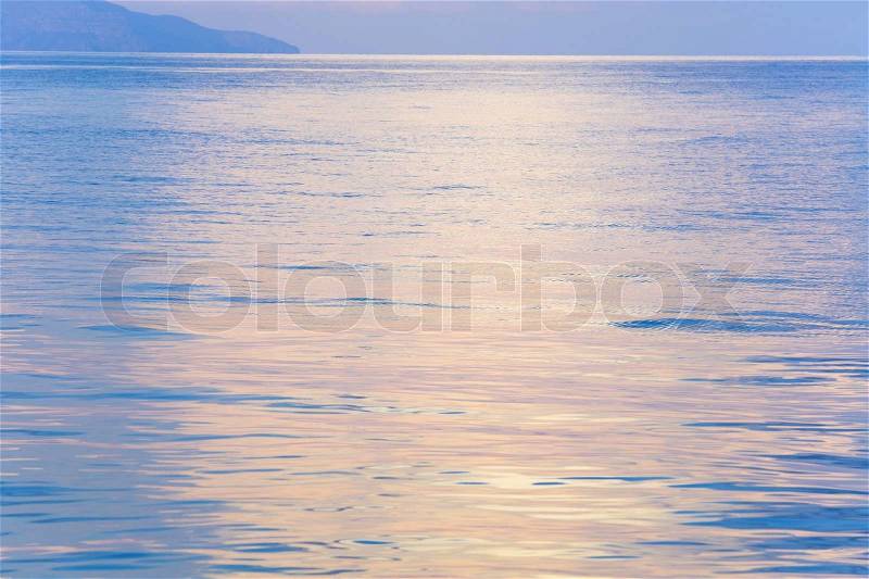 Beautiful sunset in soft pink color and shining sea surface Crimea, Ukraine, stock photo