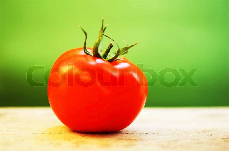 Closeup on red tomato with shallow DOF, stock photo