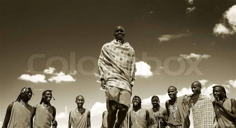 African traditional jumps, Masai Mara warriors dancing, Kenya, stock photo