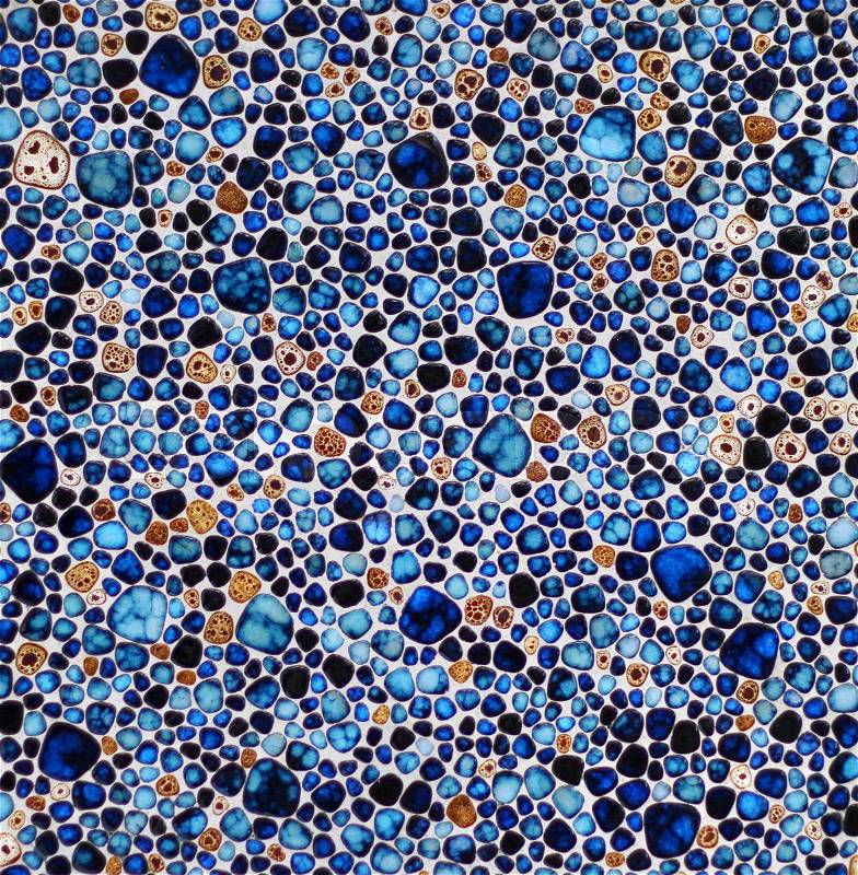 Colorful round edges blue brown stones mosaic background, stock photo
