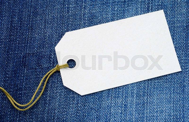 Label for goods estimation on a jeans fabric, stock photo