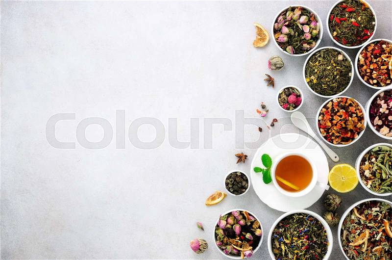 Assortment of dry tea in white bowls. Tea types backgound: green, black, floral, herbal, mint, melissa, ginger, apple, rose, lime tree, fruits, orange, hibiscus, raspberry, cornflower, cranberry, stock photo