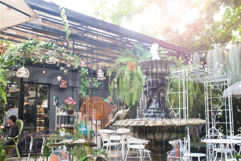 Vintage style fountain in garden backyard, Cafe or restaurant , stock photo
