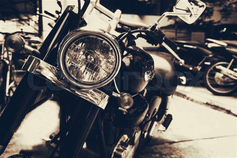 Vintage old classic motorcycles - vintage film grain sepia color effect, stock photo