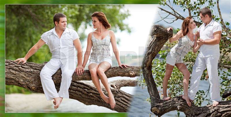 Young couple in love are sitting cross-legged on a tree branch above the river in nice sunny day, stock photo