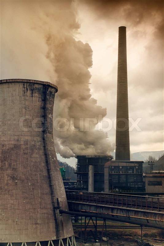Heavy smoke from industrial chimney polluting the environment, stock photo