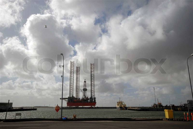Oil rig and Danish island Fanoe can be seen in the background, stock photo