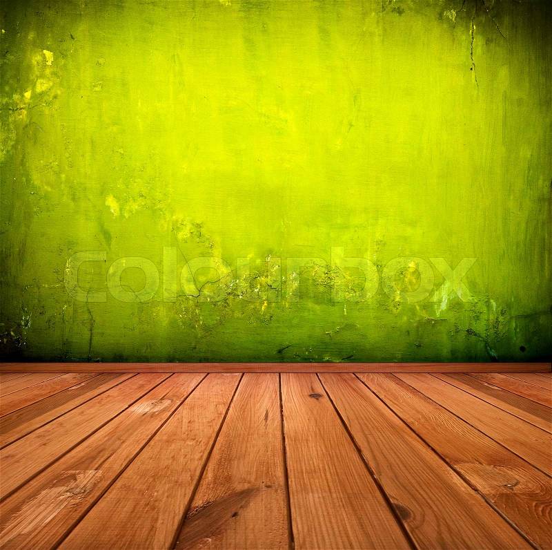 Dark vintage green room or interior with wooden floor and artistic shadows added, stock photo