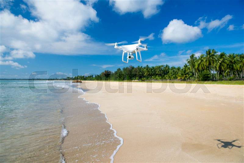 Drone flying over sea, stock photo