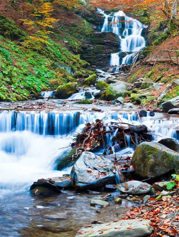Waterfalls on Rocky Stream, Running Through Autumn Mountain Forest Two shots stitch image, stock photo