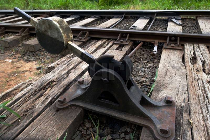 Old railroad switch. Device that can change the railway road side, stock photo