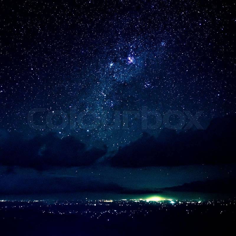 Night view on small village and stars on black sky in Sri Lanka, stock photo