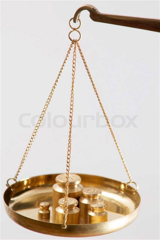 A picture of golden jewelry scales, stock photo