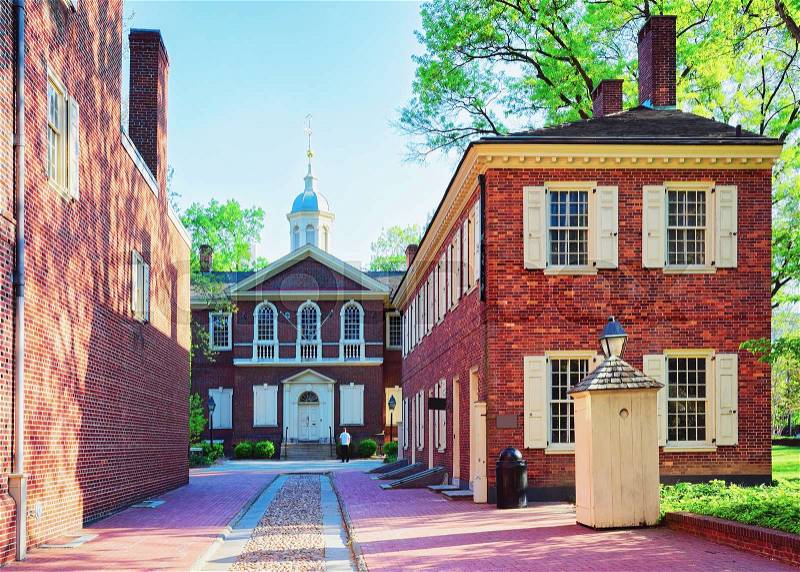 Carpenters Hall in the Old City of Philadelphia, in Pennsylvania, the USA. It is a building for the Carpenters union meetings. Tourists in the street, stock photo