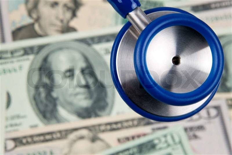 Many dollar bills and stethoscope photo icon health costs, stock photo