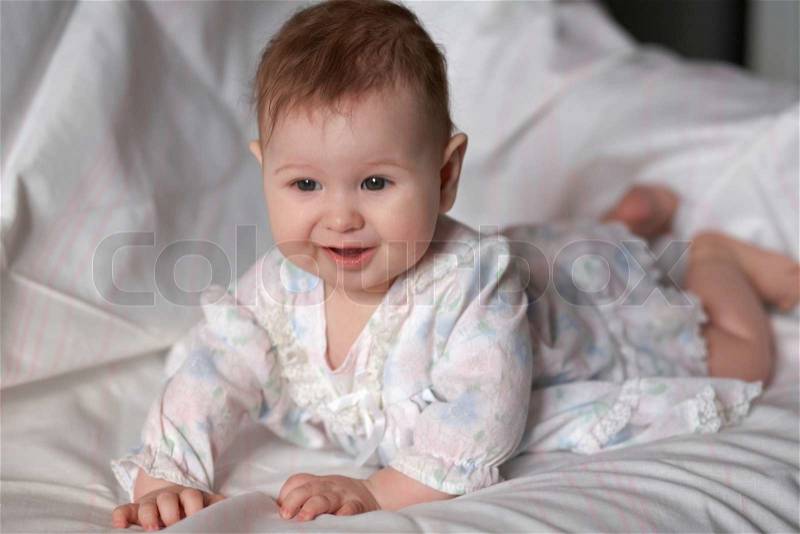 An image of bay-girl on the bed, stock photo