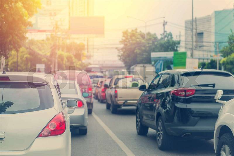 Traffic jam with rows of cars during rush hour on road, stock photo