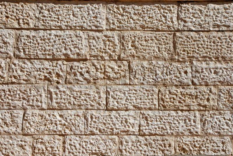 Wall built of Jerusalem stone blocks limestone, stock photo