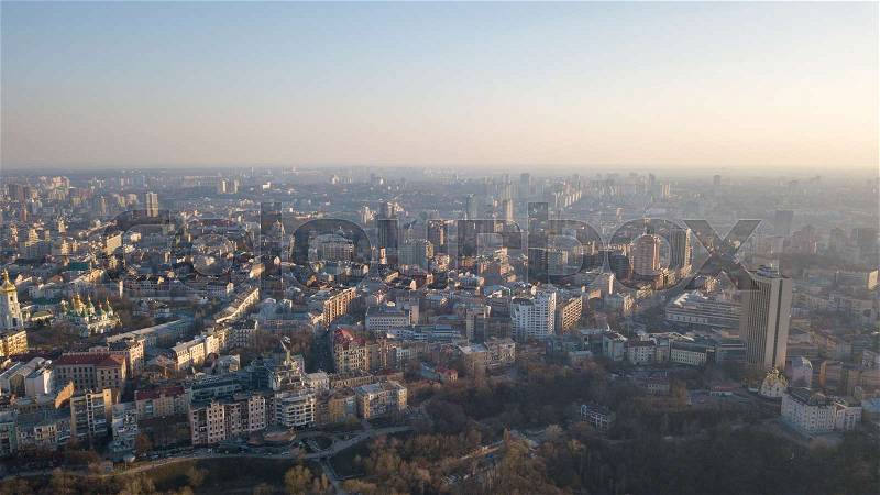 Aerial photography from the drone to the Central House of Artists, Trading house, Peizazhna Alley and districts with chuches and old building houses in the city of Kiev, Ukraine a shot at sunset in the summer, stock photo